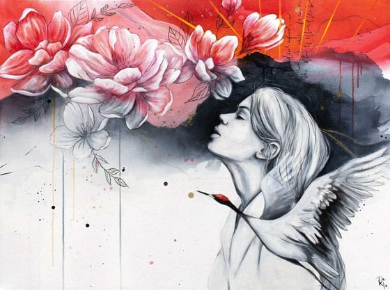 Garden, a woman in black and white beneath pink flowers