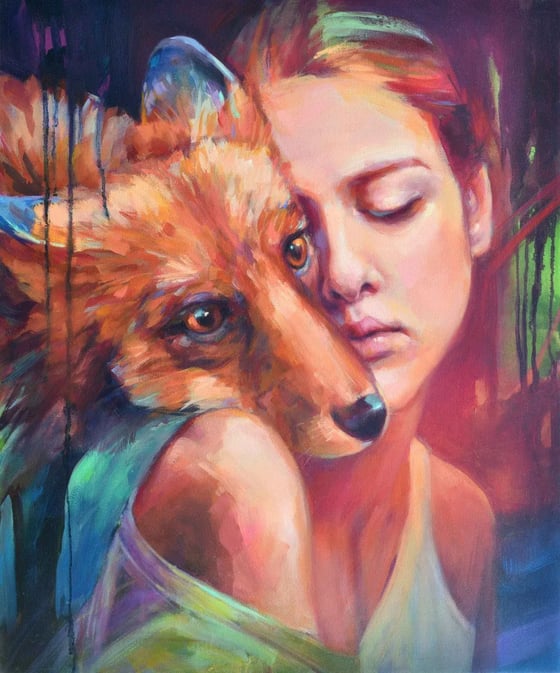 Guardian, a woman resting her face against a fox
